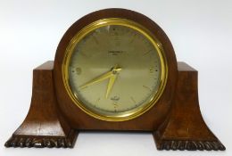 An Elliott walnut cased mantel clock, inscribed 'Carmichael', height 12cm.