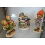 A Goebel Hummel figure of `Retreat to Safety`, 15cm high, and two other large Hummel figures (3)