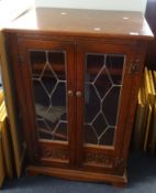 An Old Charm style music cabinet.