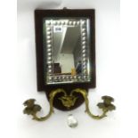 A late Victorian hall mirror with gilt candle sconces and a pear glass drop