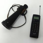 A vintage BT ebony mobile phone with user guide etc together with a Barr and Stroud single optical