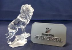 Swarovski Crystal Glass, 'Lion Standing On Rock' (broken tail), complete with box.