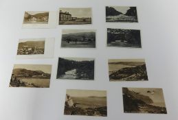 A collection of early 20th century Postcards including Dartmoor, Tucks and British Empire Exhibition