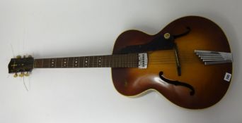 A Hofner six string acoustic guitar, probably circa 1950's, with canvas bag.