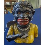 A vintage cast metal 'Dinah' money bank.