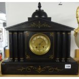 Large Victorian architectural black marble mantel clock with eight day movement.