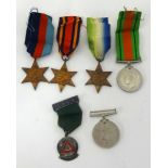 Five WWII medals including The Atlantic Star, also 1964 five years drivers award medal and ribbons.