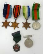 Five WWII medals including The Atlantic Star, also 1964 five years drivers award medal and ribbons.