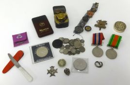 A box of various items including coins, two WW11 medals awarded to S.R Blackmore, Plymouth and