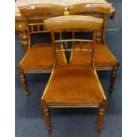 A set of eight William IV rosewood framed dining chairs, with drop in seats.