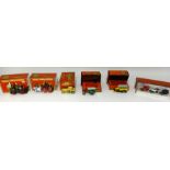 A collection of Matchbox Models of Yesteryear which includes advertising vans and a Y16 Cadillac and