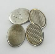 A pair of silver oval gents cufflinks, approx 12.30gms.