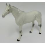 A large Beswick dapple grey racehorse, height 26cm.