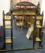 A late Victorian ebonised and parcel gilt over mantel mirror decorated with birds and flowers.