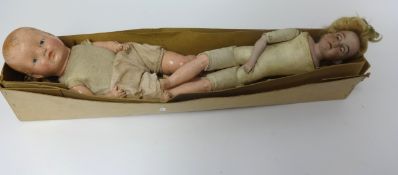 Two dolls, including American Herndon bisque head doll with kid body, also a composition doll (2).