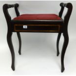 An early 20th Century stained wood and inlaid piano stool.