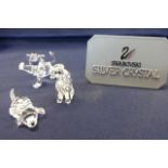 Swarovski Crystal Glass, collection consisting of poodle with box, lion cub and small dog.