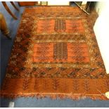 An Eastern wool rug, approx 170cm x 136cm.