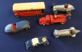 Schuco, a Studio 10 clockwork tinplate racing car and two others, Techno Volvo model etc (7)