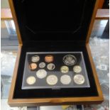 The Royal Mint 2010 proof coin set, boxed edition no. 1028, together with three framed coin