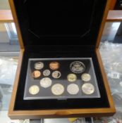 The Royal Mint 2010 proof coin set, boxed edition no. 1028, together with three framed coin