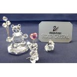 Swarovski Crystal Glass, a collection of three bears, two with balloons.