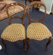 Set 4 Victorian 'balloon' back dining chairs, with overstuffed seats and cabriole legs.