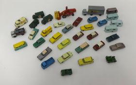 A box of thirty six playworn older Matchbox toys (mostly 1-75 models).