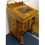 A Victorian walnut Davenport desk.