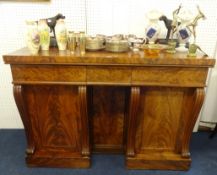 A Victorian mahogany sideboard with frieze drawers, cupboards and serpentine supports, width