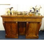 A Victorian mahogany sideboard with frieze drawers, cupboards and serpentine supports, width
