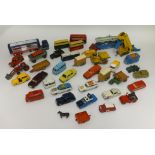 A box of thirty nine playworn and repainted Dinky Toys and Corgi Toys etc.
