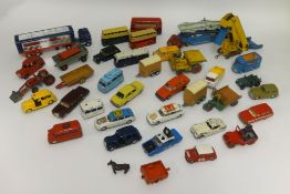 A box of thirty nine playworn and repainted Dinky Toys and Corgi Toys etc.