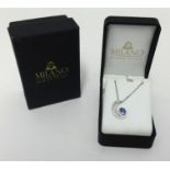 Molano, a modern 14ct gold tanzanite and diamond contemporary pendant on chain with original box and