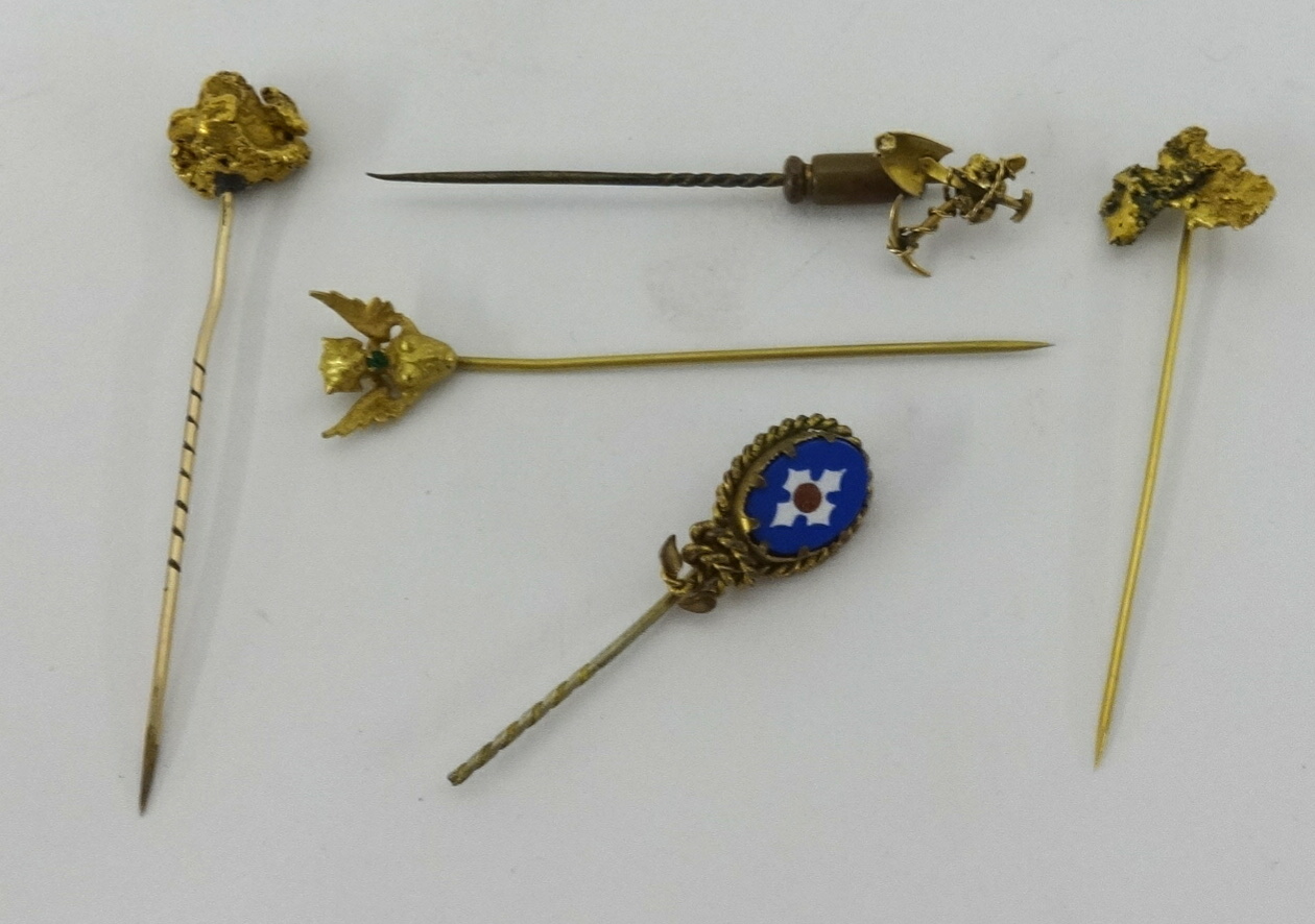 Four gold miners tie pins, total weight approx 16.80gms