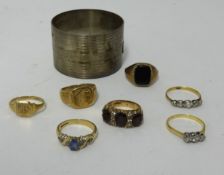 Eight various rings including one 18ct (1.7gms) and seven 9ct with mixed settings approx 22.3gms