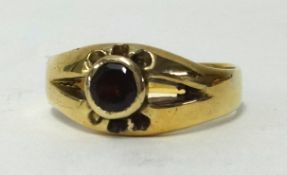 An 18ct garnet set dress ring, approx 7gms, ring size V1/2