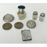 A silver vesta, a silver circular compact, a silver salt, a pair of sterling silver peppers and