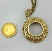A QEII 1966 gold sovereign set within a 9ct gold pendant (weight of pendant 18.50gms).