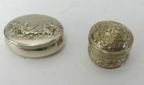White metal vinaigrette and a silver decorated snuff box, C & S, with gilt interior (2) total weight
