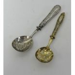 Two continental silver castor spoons (2)