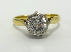An 18ct solitaire diamond set ring, the round diamond approx 0.75cts.