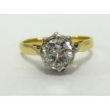 An 18ct solitaire diamond set ring, the round diamond approx 0.75cts.