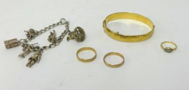 Two 9ct gold wedding bands (4.2gms), 18ct gold and diamond set ring (2.90gms), a silver charm