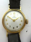 Omega, a ladies 9ct gold traditional wristwatch in original box.
