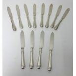 A twenty four setting silver fish set with silver handles and silver blades, London W & H Ltd t/w