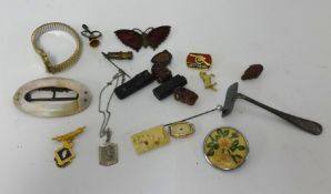 A bag of various items including mother of pearl buckle brooch, traditional ladies gold watch