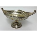 A George V silver dish with stem base, with embossed decoration, circa 1949, approx 20oz.