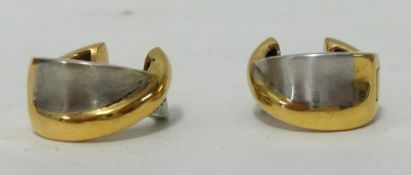 A pair of yellow and white gold earrings, approx 6.5gms of contemporary style each set with a