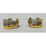 A pair of yellow and white gold earrings, approx 6.5gms of contemporary style each set with a